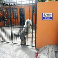 Warning: Property Protected by Trained Dogs